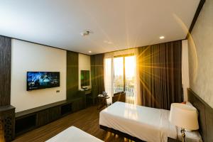 Et tv og/eller underholdning på The One Ha Long Hotel