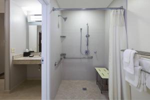 a bathroom with a shower and a sink at Courtyard by Marriott New Orleans Downtown Near the French Quarter in New Orleans +16 photos