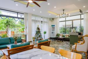 Posezení v ubytování Palm Riverside Boutique