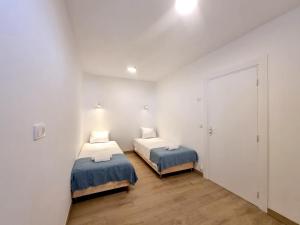 Postel nebo postele na pokoji v ubytování Appartements MONACO La Turbie