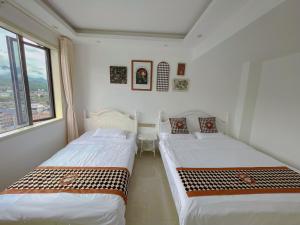 Photo de la galerie de l'établissement 一禾小居观景民宿, à Zhangjiajie