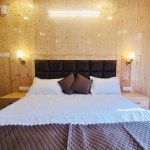 Voodi või voodid majutusasutuse Ekaant Stays - Manali toas
