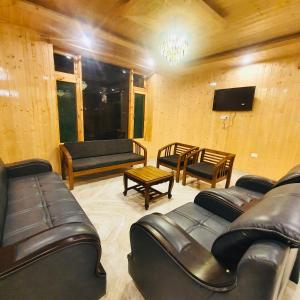 Istumisnurk majutusasutuses Ekaant Stays - Manali