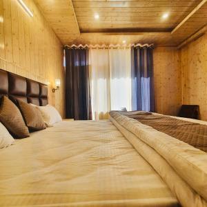 Voodi või voodid majutusasutuse Ekaant Stays - Manali toas