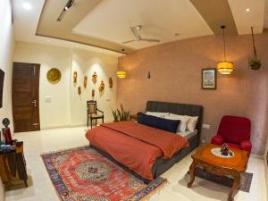 Ένα ή περισσότερα κρεβάτια σε δωμάτιο στο Vamsa Boutique Stay +55 φωτογραφίες