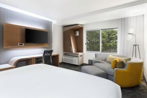 Voodi või voodid majutusasutuse Courtyard by Marriott Ruston toas