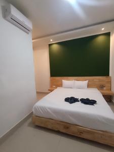 Voodi või voodid majutusasutuse D'Hills Hotel toas