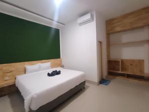 Voodi või voodid majutusasutuse D'Hills Hotel toas