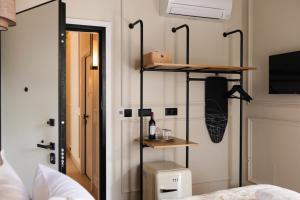 Postel nebo postele na pokoji v ubytování Airy Athens Suites