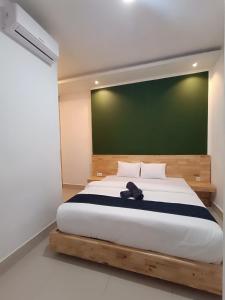Voodi või voodid majutusasutuse D'Hills Hotel toas
