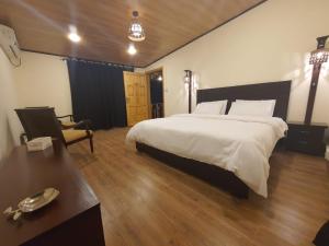 Postel nebo postele na pokoji v ubytování Kunhar Resort - Kiliç Cottage