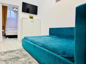 TV a/nebo společenská místnost v ubytování Joy City Stay Augustin 2