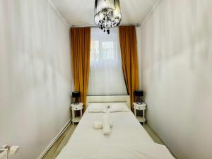 Postel nebo postele na pokoji v ubytování Joy City Stay Augustin 2