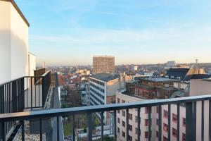 Nespecifikovaný výhled na destinaci Brusel nebo výhled na město při pohledu z hotelu