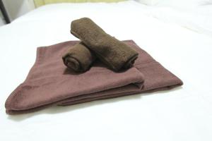 Postel nebo postele na pokoji v ubytování LUANA in KICHIJOJI