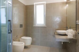 Ein Badezimmer in der Unterkunft Mercury Beach Hotel