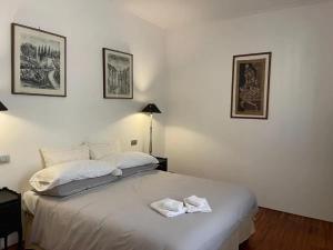 Ένα ή περισσότερα κρεβάτια σε δωμάτιο στο Spacious apartment in Manciano with view