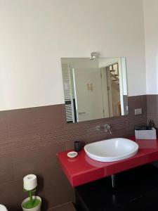 Ένα μπάνιο στο Spacious apartment in Manciano with view