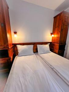 Postel nebo postele na pokoji v ubytování Banderitsa Hotel