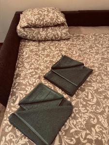 Postel nebo postele na pokoji v ubytování Pearl Bee Deluxe Suites