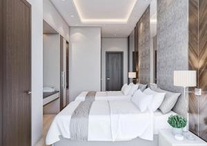 Uma cama ou camas num quarto em ZARA HoTEL