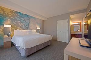 Postel nebo postele na pokoji v ubytování Courtyard by Marriott Westbury Long Island