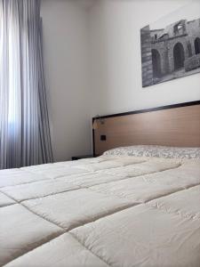 Postel nebo postele na pokoji v ubytování Vecchio Frantoio Villa Rosa