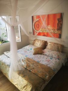 Posteľ alebo postele v izbe v ubytovaní Yumbo room