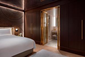 Ein Bett oder Betten in einem Zimmer der Unterkunft Almanac Palais Vienna