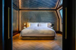 Ein Bett oder Betten in einem Zimmer der Unterkunft Almanac Palais Vienna