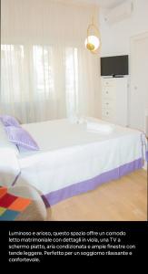 Postel nebo postele na pokoji v ubytování La casa di Dette + 5 fotografií