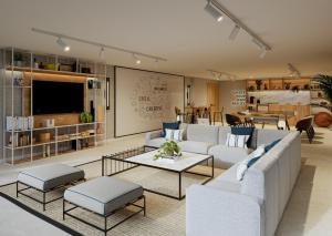 a living room with a couch and a table at INNSiDE by Meliá Alicante Porta Maris in Alicante