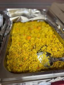a tray full of food with a spoon in it at RADISSON lUXURY RUM CAMP in Wadi Rum