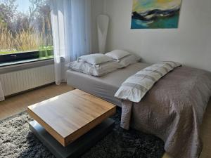 Postel nebo postele na pokoji v ubytování Quartier 2