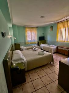 Postel nebo postele na pokoji v ubytování Hotel C0C00N Garden + 37 fotografií