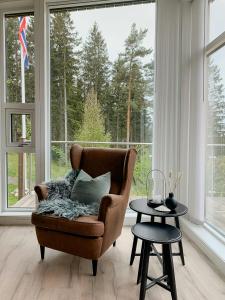 Posezení v ubytování Cabin With Oslofjord View At Jeløya