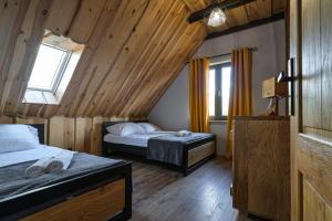 Posteľ alebo postele v izbe v ubytovaní Dadajowa Osada - Dadaj