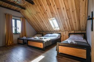 Posteľ alebo postele v izbe v ubytovaní Dadajowa Osada - Dadaj + 37 fotografií