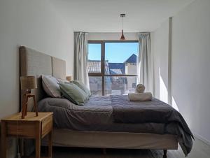 Ένα ή περισσότερα κρεβάτια σε δωμάτιο στο Design Studio centro de Bariloche +92 φωτογραφίες