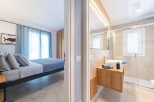 Postel nebo postele na pokoji v ubytování Elbitat Homes + 61 fotografií