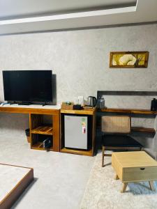 TV a/nebo společenská místnost v ubytování Flower Resort