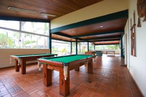 a billiard room with two pool tables in it at Hotel Berro D`Agua Eco Resort in Avaré
