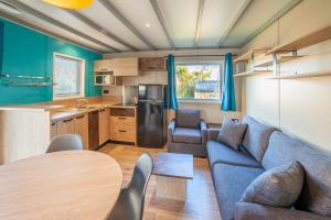 Posezení v ubytování Camping de la Dune "Les Flots Bleus"
