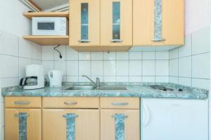 Kuchyň nebo kuchyňský kout v ubytování Apartments Barbara