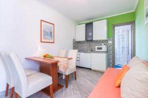 Kuchyň nebo kuchyňský kout v ubytování Apartments Barbara
