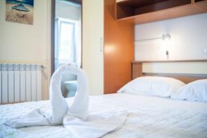 Postel nebo postele na pokoji v ubytování Apartments Barbara