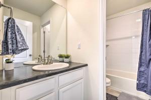a bathroom with a sink and a toilet at Charming 3BR Retreat - Perfect for Families! in Fort Collins +21 photos