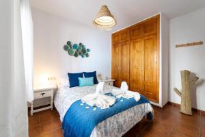 Cama o camas de una habitación en La Casa Del Bosque