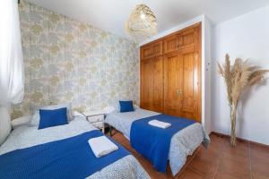 Cama o camas de una habitación en La Casa Del Bosque
