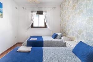 Cama o camas de una habitación en La Casa Del Bosque